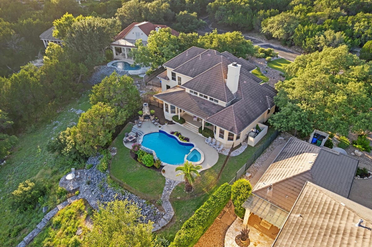 View 17909 Kingfisher Ridge DR in Waterford On Lake Travis Sec 01 17909 Kingfisher Ridge DR - front exterior - Luxury home in Waterford On Lake Travis Sec 01, Lago Vista, TX
