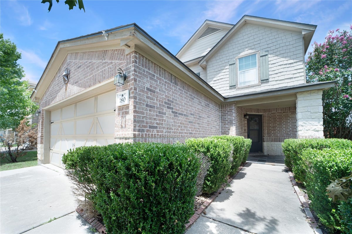 View 180 Beech Dr in Waterleaf Ph B Sec 1 180 Beech Dr - front exterior - Luxury home in Waterleaf Ph B Sec 1, Kyle, TX