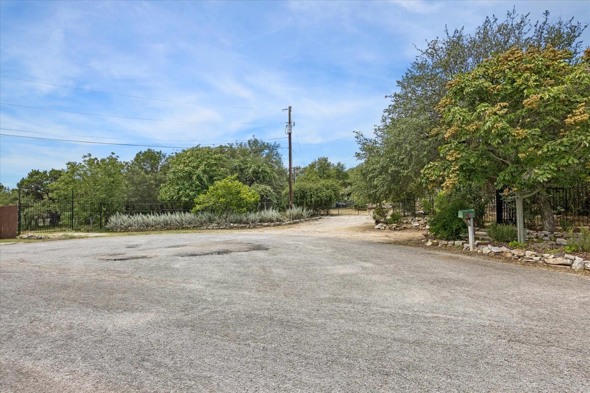 View 180 Donna DR in Cedar Ridge Estate 180 Donna DR - property photo 1 - Luxury lot in Cedar Ridge Estate, Wimberley, TX