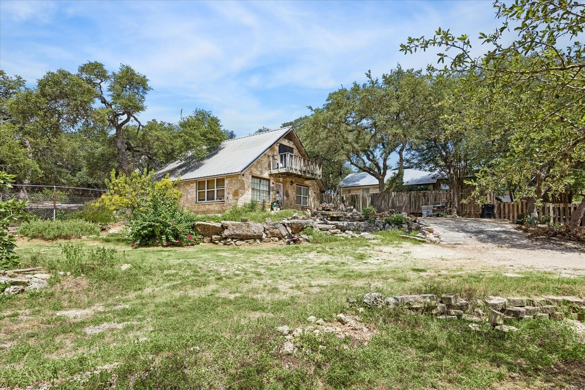 View 180 Donna DR in Cedar Ridge Estate 180 Donna DR - front exterior - Luxury home in Cedar Ridge Estate, Wimberley, TX