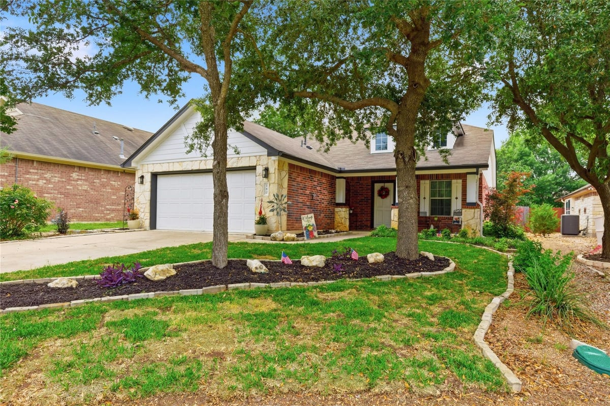 View 180 Mystic Shadow Ln in Whispering Hollow Ph 1 Sec 3 180 Mystic Shadow Ln - front exterior - Luxury home in Whispering Hollow Ph 1 Sec 3, Buda, TX