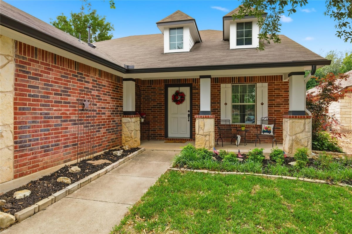 View 180 Mystic Shadow LN in Whispering Hollow Ph 1 Sec 3 180 Mystic Shadow LN - property photo 1 - Luxury home in Whispering Hollow Ph 1 Sec 3, Buda, TX