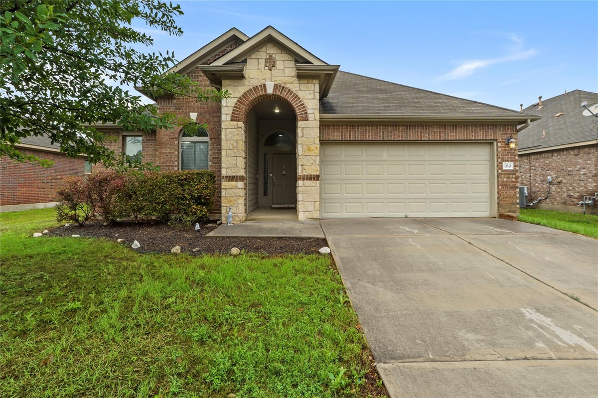View 180 Snow Owl Hollow in The Meadows At Buda Sec Three-A 180 Snow Owl Hollow - front exterior - Luxury home in The Meadows At Buda Sec Three-A, Buda, TX