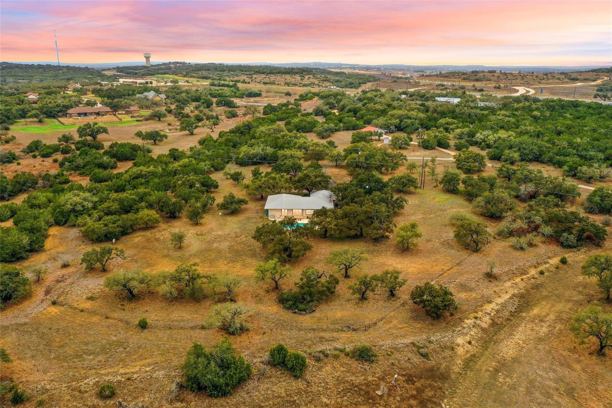 1800 E 290 Hwy - front exterior - Luxury home in Dripping Springs, TX