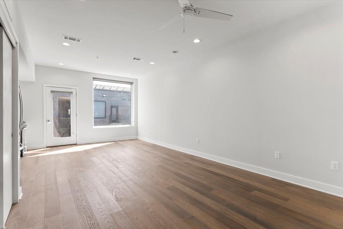 Primary bedroom at 1800 E 4th St Unit #331 - Fourth and Condominiums, Austin, TX