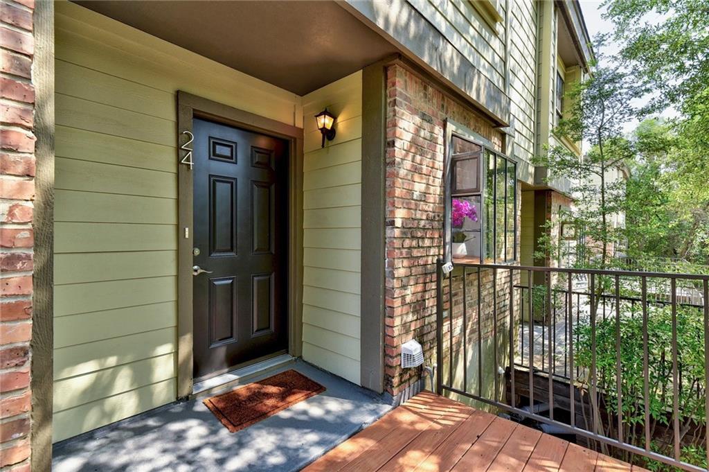 View 1804 Capital Pkwy Unit #24 in Barton Creek Twnhms Amd 1804 Capital Pkwy Unit #24 - front exterior - Luxury home in Barton Creek Twnhms Amd, Austin, TX