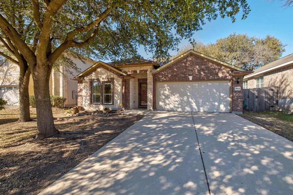 View 1804 McClannahan Dr in Rancho Alto Ph 02 1804 McClannahan Dr - front exterior - Luxury home in Rancho Alto Ph 02, Austin, TX