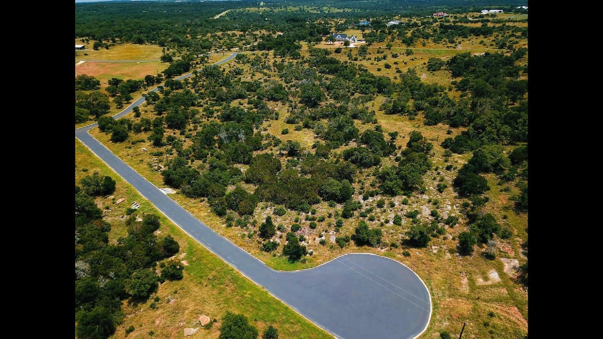 View 181 Kadens Blf in The Bl Uffs At Round Mountain 181 Kadens Blf - front exterior - Luxury lot in The Bl Uffs At Round Mountain, Round Mountain, TX