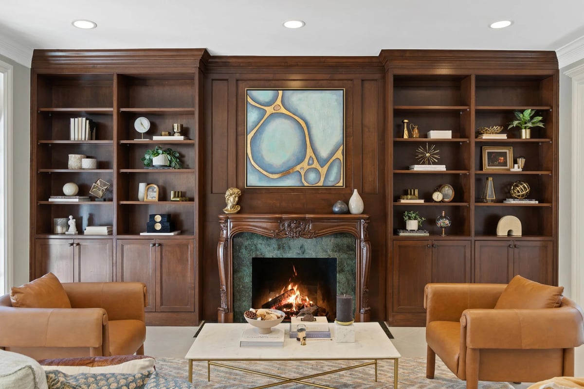 1810 W 35th Street - family room with walnut built-ins and stone fireplace, view 3