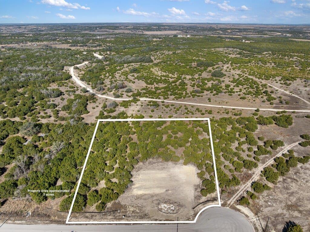 View 182 Whispering Wind Rd in Whispering Wind 182 Whispering Wind Rd - front exterior - Luxury lot in Whispering Wind, Bertram, TX