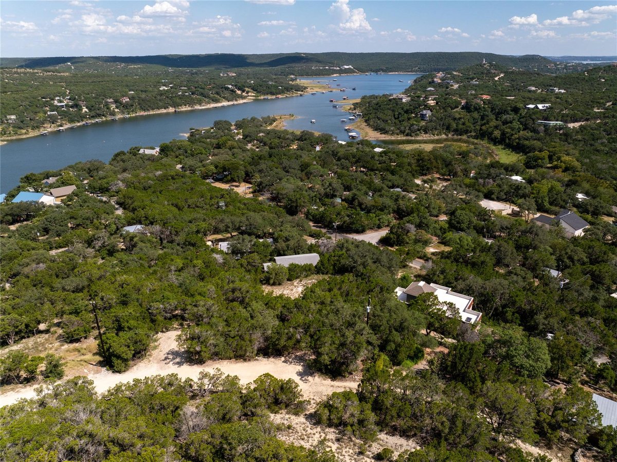 View 18212 Easy St in Gregg Point 18212 Easy St - front exterior - Luxury lot in Gregg Point, Jonestown, TX