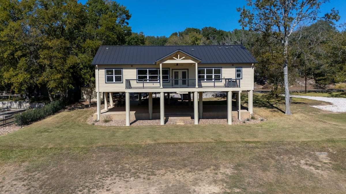 View 1830 & 1834 Flite Acres Rd in Eagle Cave View 1830 & 1834 Flite Acres Rd - front exterior - Luxury home in Eagle Cave View, Wimberley, TX