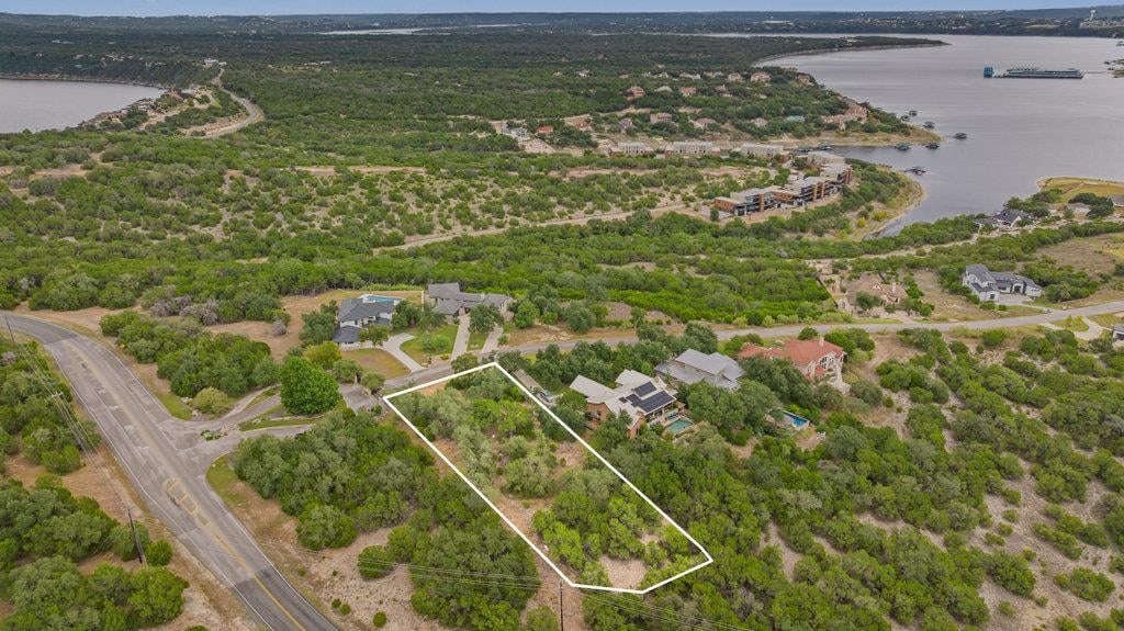 View 18305 Cedar Sage Ct in Waterford On Lake Travis Sec 6 18305 Cedar Sage Ct - front exterior - Luxury lot in Waterford On Lake Travis Sec 6, Lago Vista, TX