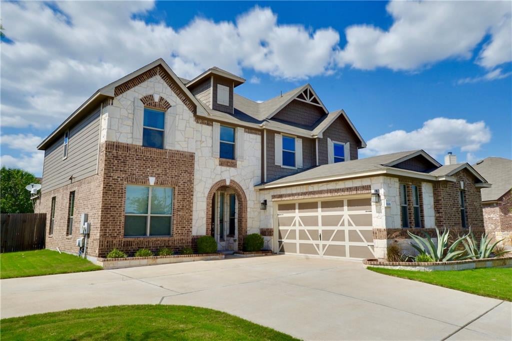 View 18308 Hickory Bark CT 18308 Hickory Bark CT - front exterior - Luxury home in Pflugerville, TX