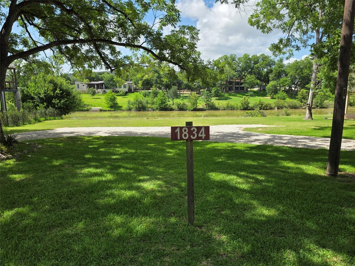 View 1834 Flite Acres RD in Eagle Cave View 1834 Flite Acres RD - property photo 1 - Luxury lot in Eagle Cave View, Wimberley, TX