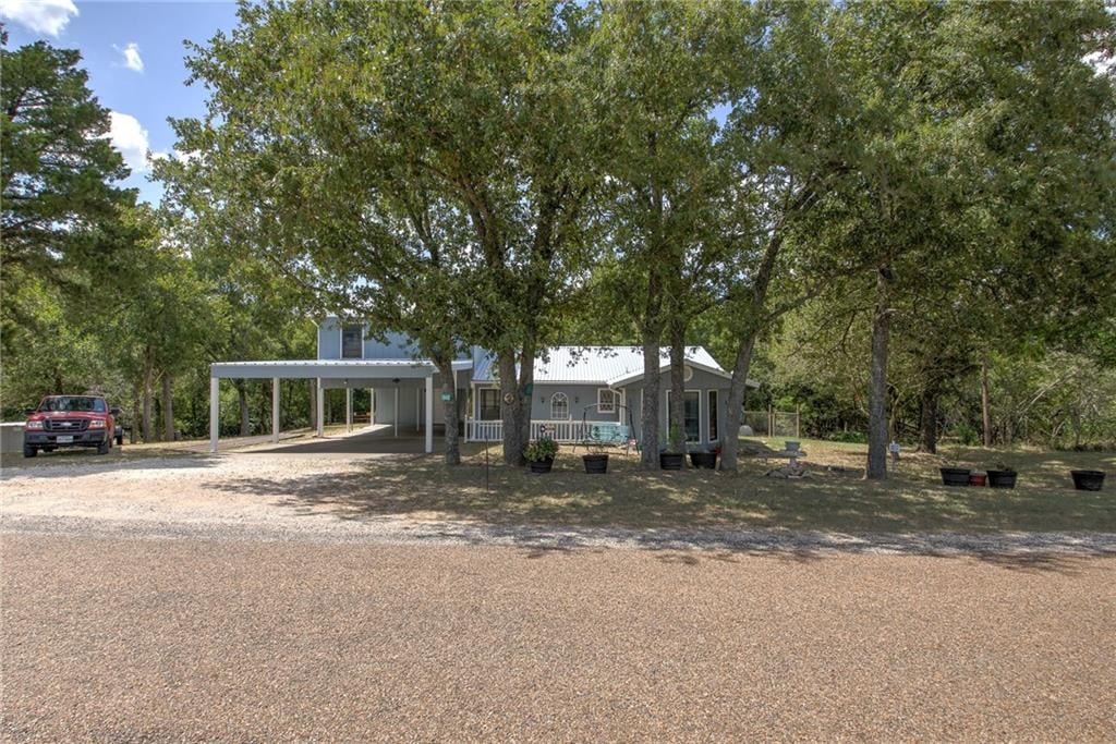 View 1840 County Road 213 1840 County Road 213 - front exterior - Luxury home in Giddings, TX