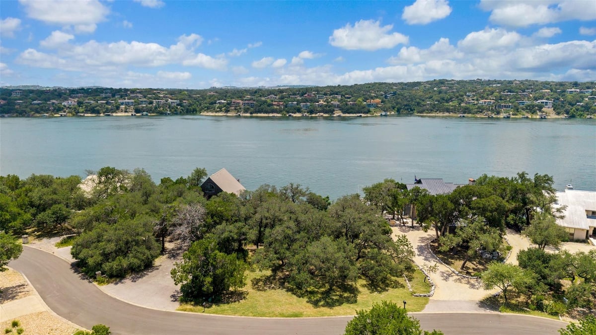 View 18401 Lakepoint CIR in Point Venture Sec 01 18401 Lakepoint CIR - property photo 1 - Luxury lot in Point Venture Sec 01, Point Venture, TX