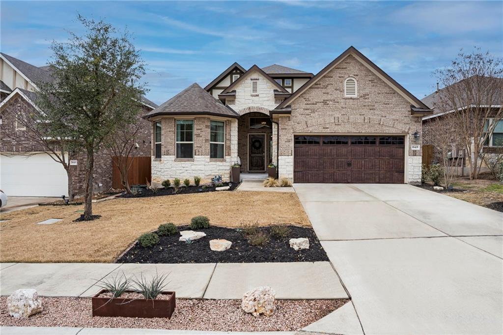 View 18405 Tanner Bayou LOOP in Sweetwater Ranch Sec 1 Village 18405 Tanner Bayou LOOP - front exterior - Luxury home in Sweetwater Ranch Sec 1 Village, Austin, TX