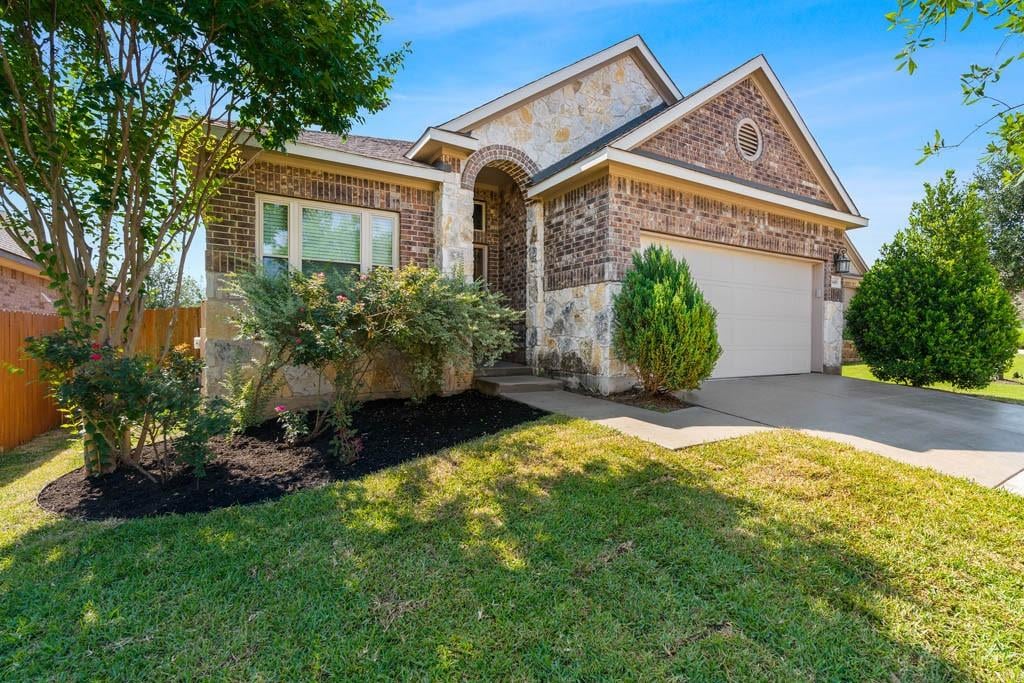 View 18409 Tanner Bayou LOOP in Sweetwater Ranch Sec 1 Village 18409 Tanner Bayou LOOP - front exterior - Luxury home in Sweetwater Ranch Sec 1 Village, Austin, TX