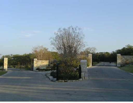 View 1845 Kingfisher Ridge CV 1845 Kingfisher Ridge CV - front exterior - Luxury lot in Lago Vista, TX