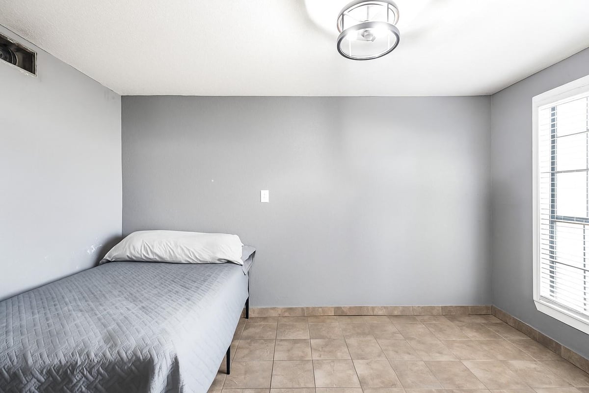 Primary bedroom at 185 County Road 107 - A0020 DICKINSON L, Caldwell, TX