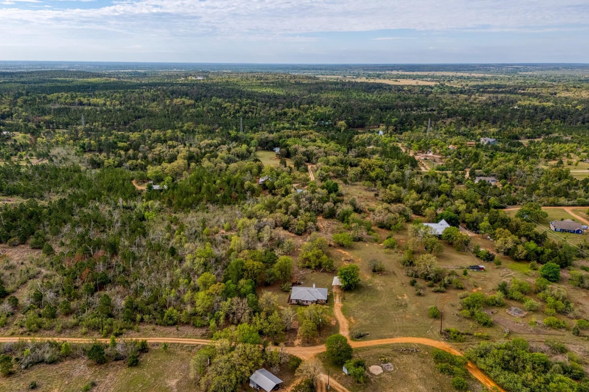 View 185 E Broken Tree Ln in Idle Acres 185 E Broken Tree Ln - front exterior - Luxury home in Idle Acres, Smithville, TX