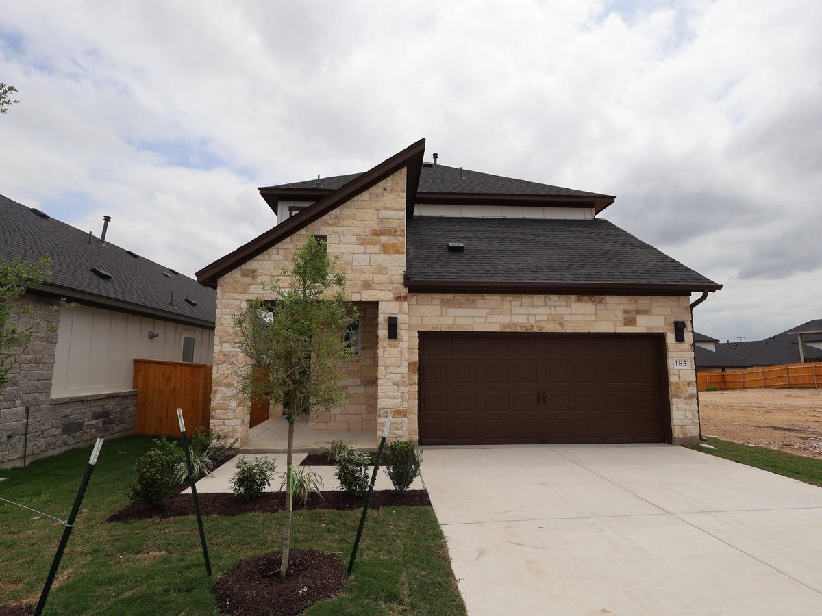 View 185 Grayson Elm PASS in Heritage 185 Grayson Elm PASS - front exterior - Luxury home in Heritage, Dripping Springs, TX