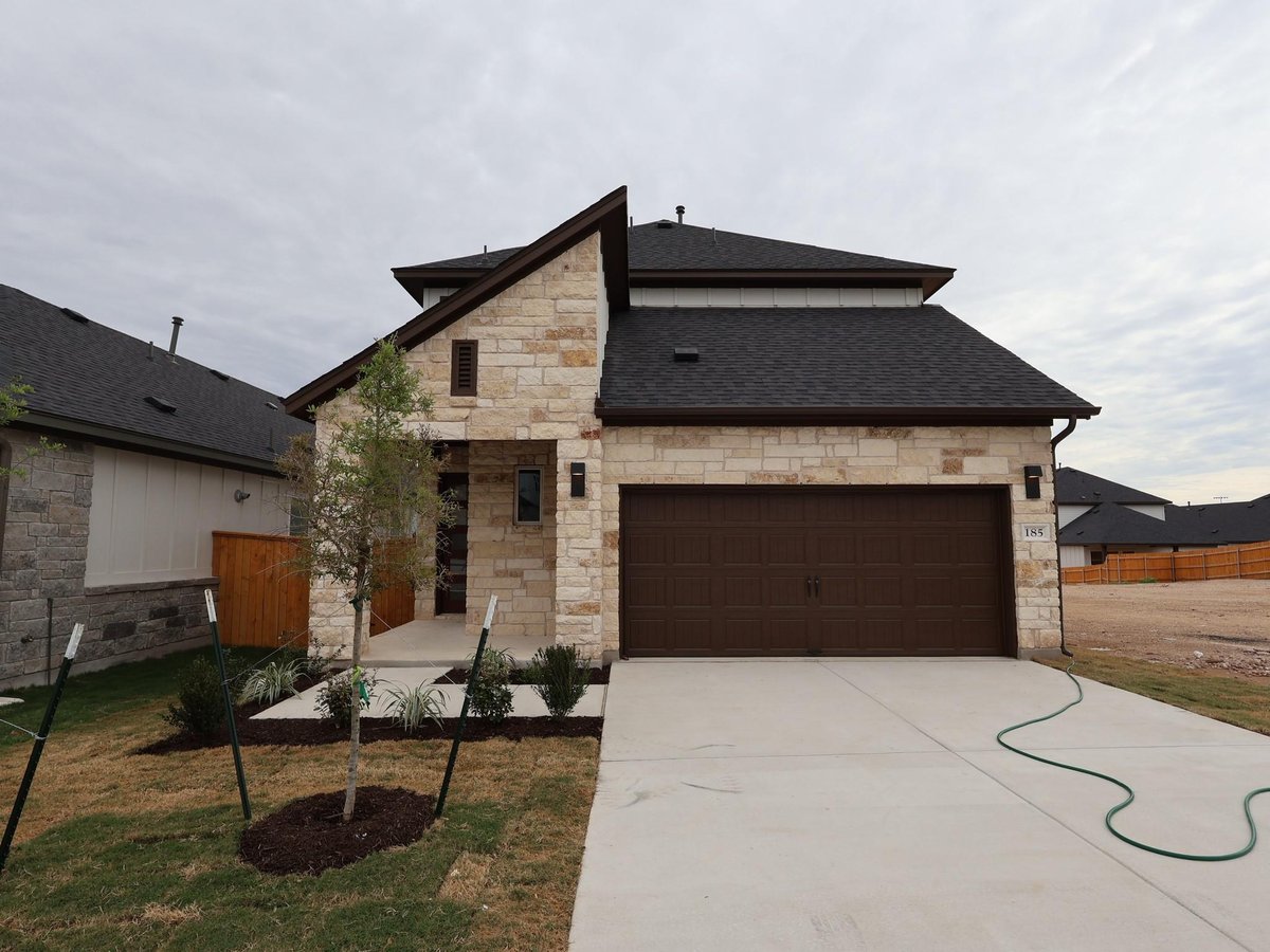View 185 Grayson Elm Pass in Heritage 185 Grayson Elm Pass - front exterior - Luxury home in Heritage, Dripping Springs, TX