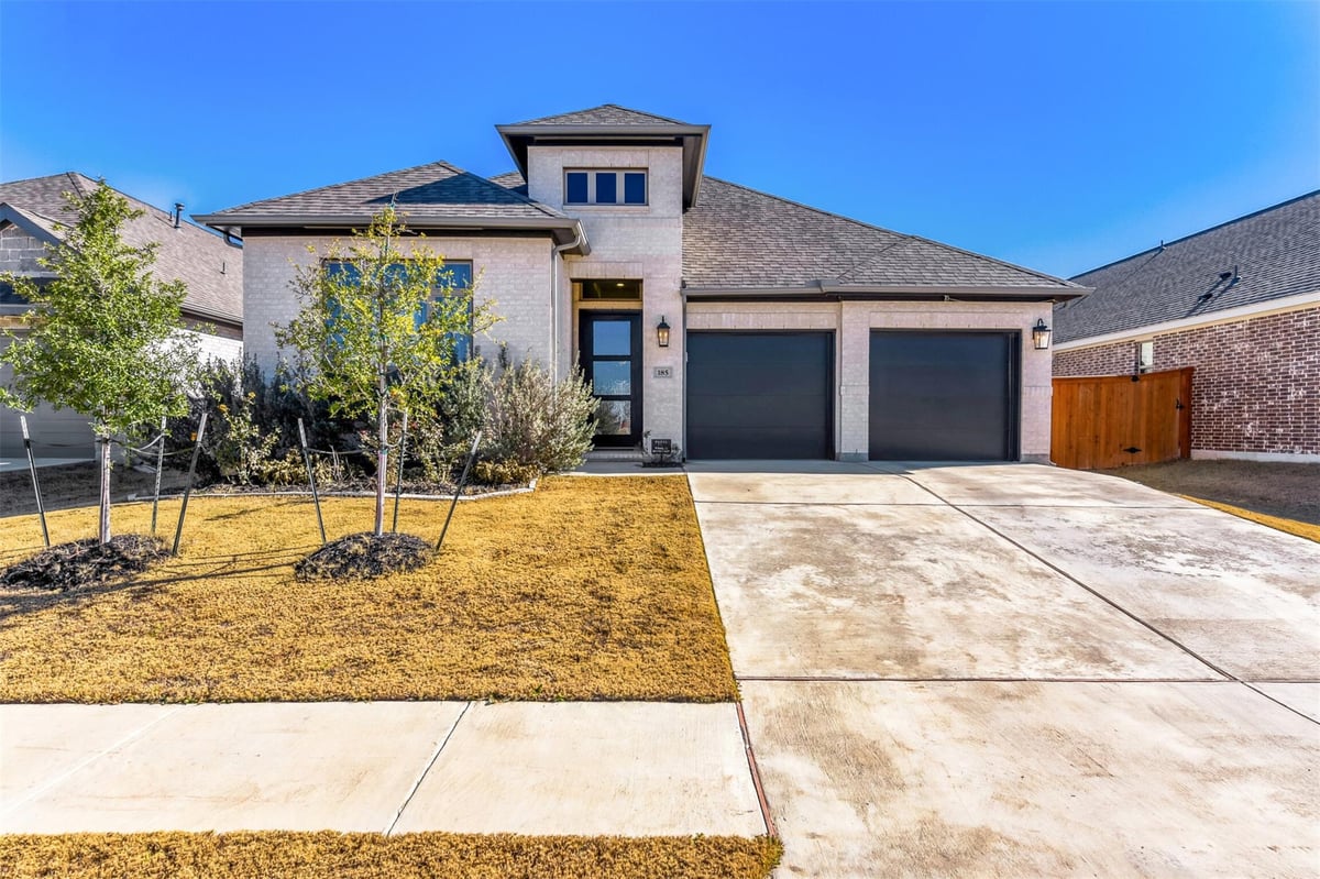 View 185 King Haakon Bay Dr in Crosswinds Ph Four-A 185 King Haakon Bay Dr - front exterior - Luxury home in Crosswinds Ph Four-A, Kyle, TX