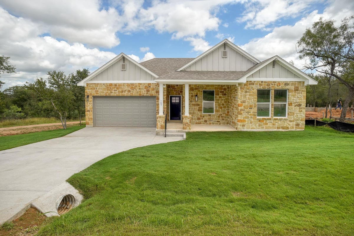 View 185 Nuuanu LN in Tahitian Village, 185 Nuuanu LN - front exterior - Luxury home in Tahitian Village,, Bastrop, TX