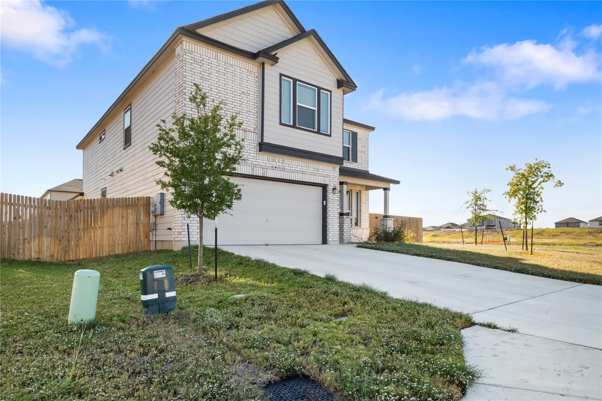 View 18501 Spotted Eagle Ln in Eagles Lndg Ph 2 18501 Spotted Eagle Ln - front exterior - Luxury home in Eagles Lndg Ph 2, Elgin, TX