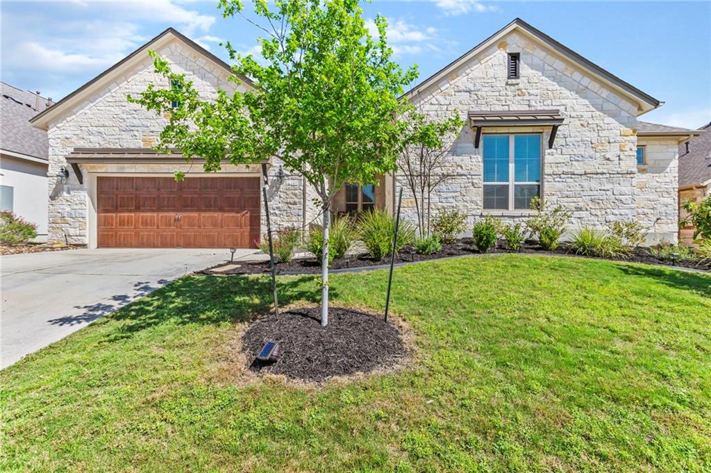 View 18504 Mcgloin TRL in Sweetwater Ranch Sec 2 Village 18504 Mcgloin TRL - front exterior - Luxury home in Sweetwater Ranch Sec 2 Village, Austin, TX