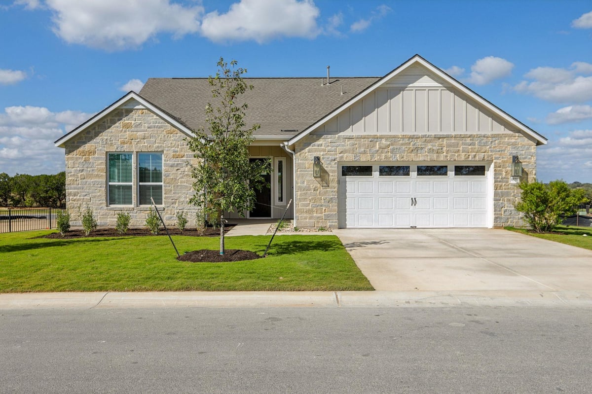 View 1851 Dancing Oak Ln in Kissing Tree 1851 Dancing Oak Ln - front exterior - Luxury home in Kissing Tree, San Marcos, TX