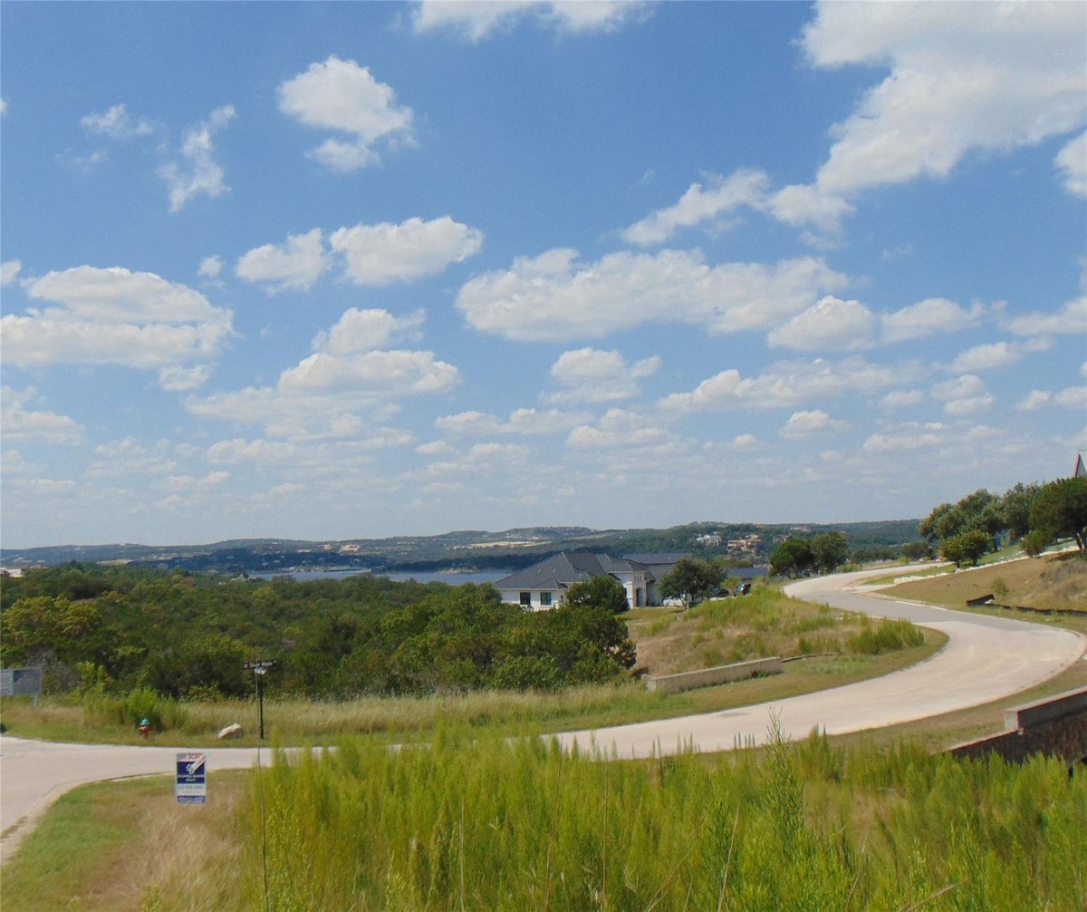 View 18512 Sugar Maple Dr in Waterford On Lake Travis Sec 4 18512 Sugar Maple Dr - front exterior - Luxury lot in Waterford On Lake Travis Sec 4, Lago Vista, TX