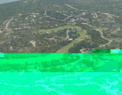 View 18601 Buckhorn CIR 18601 Buckhorn CIR - front exterior - Luxury lot in Point Venture, TX