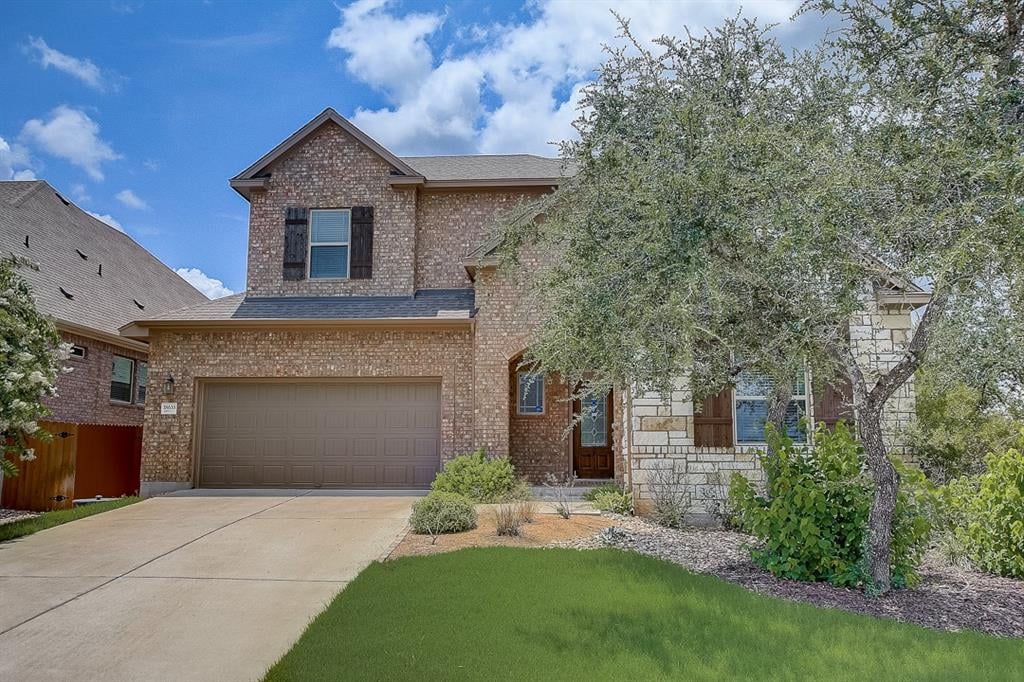 View 18633 Amberg PL in Sweetwater Ranch Sec 1 Village 18633 Amberg PL - front exterior - Luxury home in Sweetwater Ranch Sec 1 Village, Austin, TX