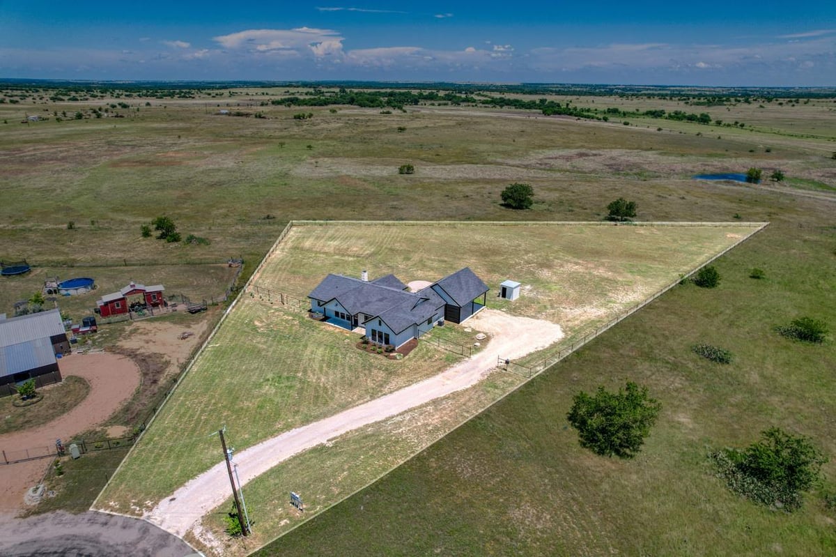 View 187 Lila LN in Bertram Creekside Ranches 187 Lila LN - front exterior - Luxury home in Bertram Creekside Ranches, Bertram, TX