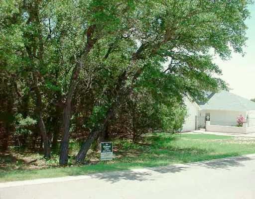 View 18705 Venture Dr 18705 Venture Dr - front exterior - Luxury lot in Point Venture, TX