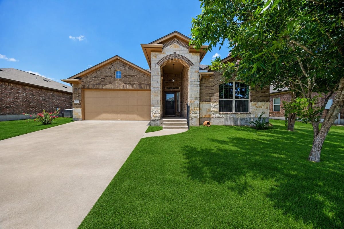 View 18717 Leigh LN in Reserve At Westcreek Amd 18717 Leigh LN - front exterior - Luxury home in Reserve At Westcreek Amd, Pflugerville, TX