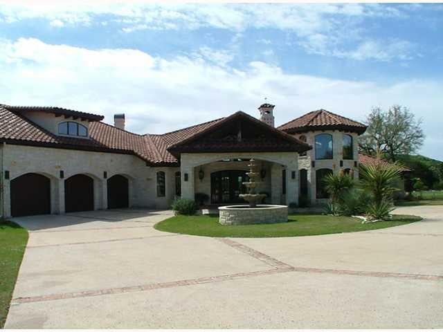 View 18725 Angel Mountain DR 18725 Angel Mountain DR - front exterior - Luxury home in Leander, TX