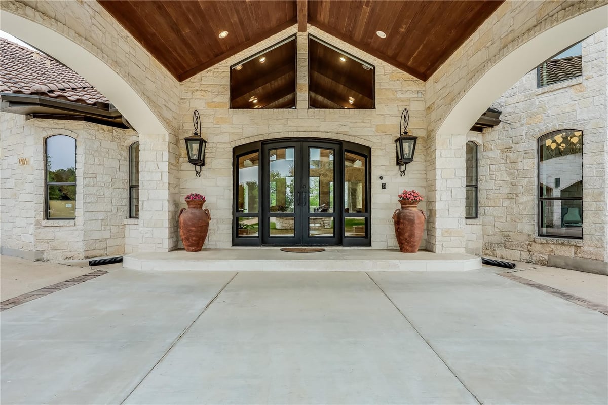 View 18725 Angel Mtn in Lone Mountain Ranch 18725 Angel Mtn - front exterior - Luxury home in Lone Mountain Ranch, Leander, TX