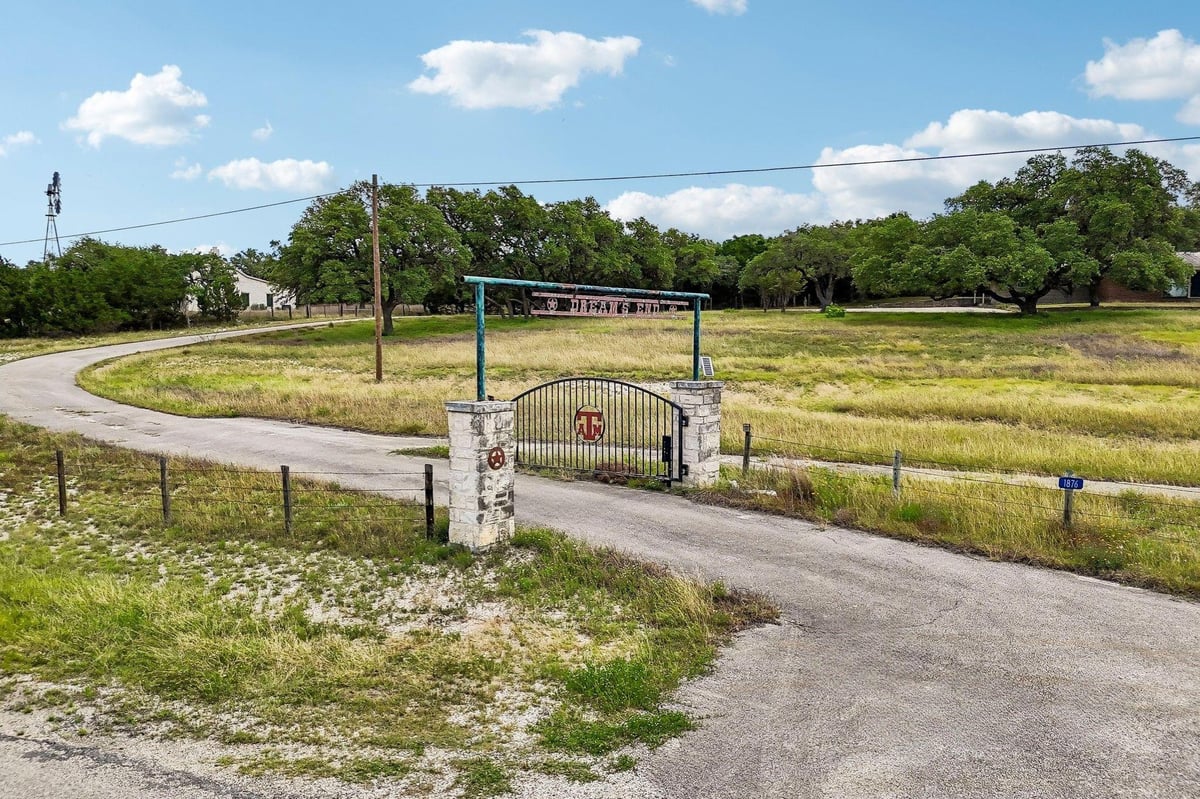 View 1876 Rocky RD in A0001 1876 Rocky RD - front exterior - Luxury home in A0001, Blanco, TX
