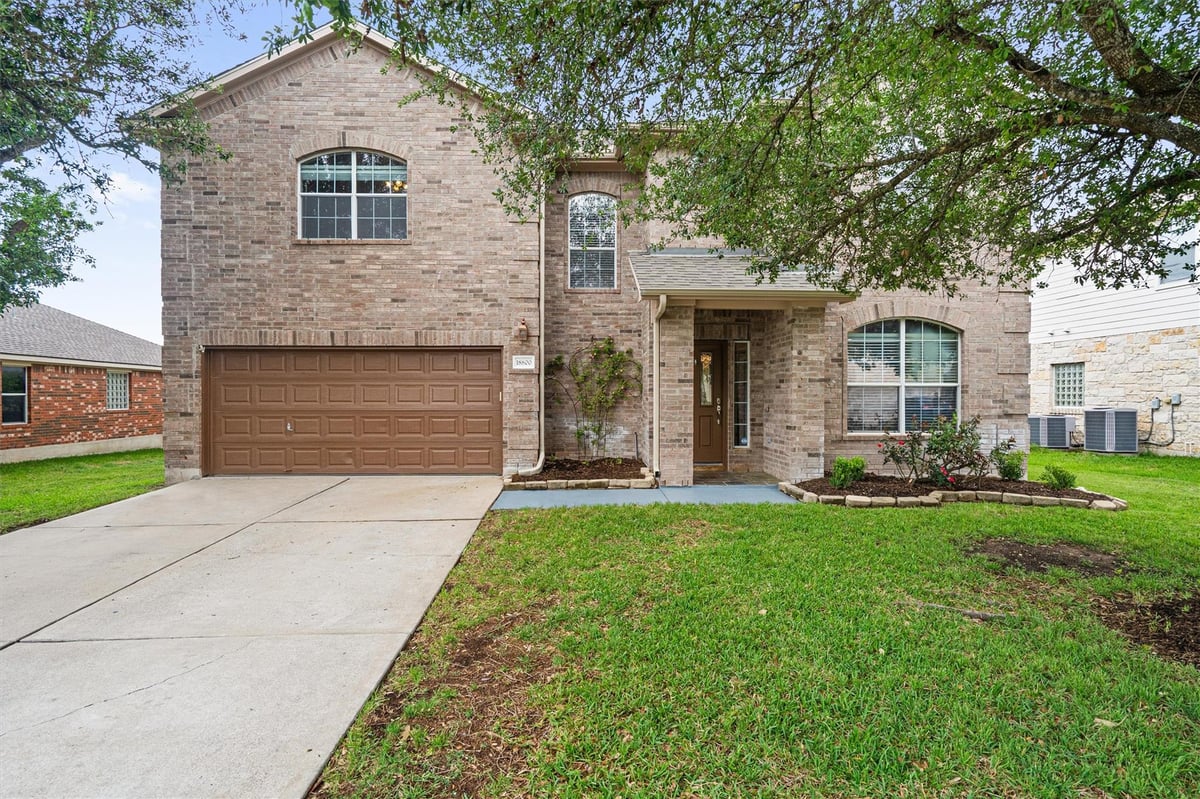 View 18800 Chrighton Castle Bnd in Highland Park North Ph C Sec 18800 Chrighton Castle Bnd - front exterior - Luxury home in Highland Park North Ph C Sec, Pflugerville, TX