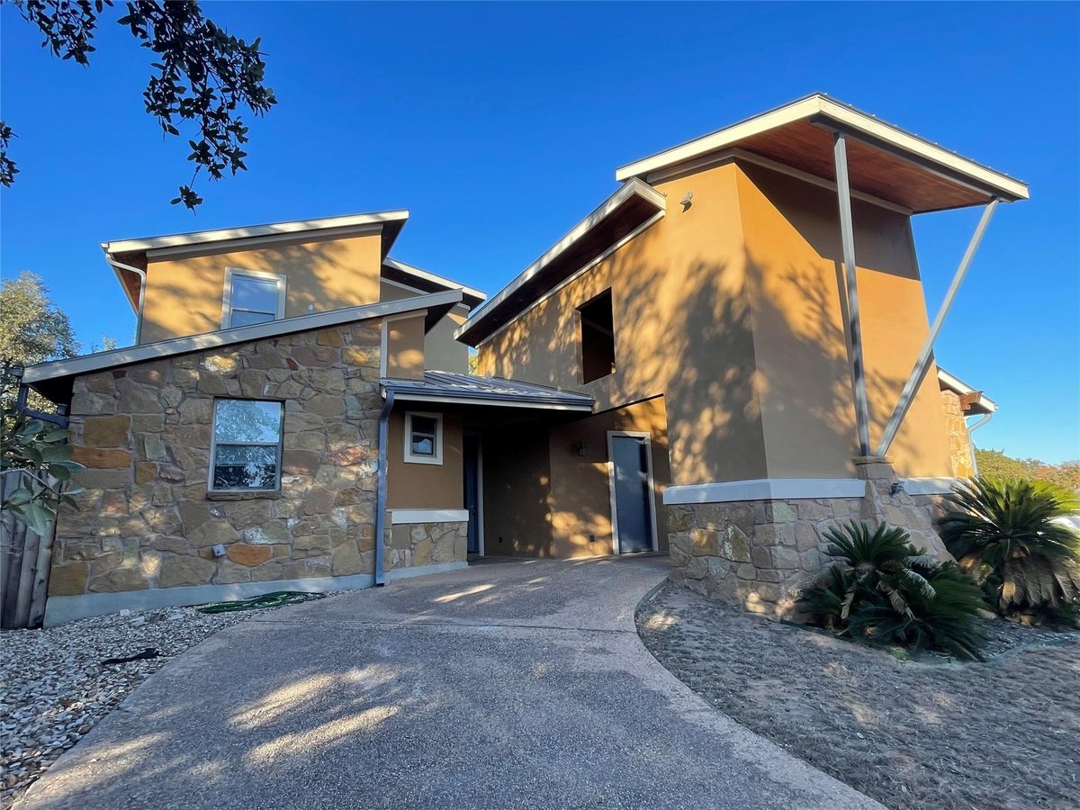 View 18800 Venture Dr in Point Venture 18800 Venture Dr - front exterior - Luxury home in Point Venture, Lago Vista, TX
