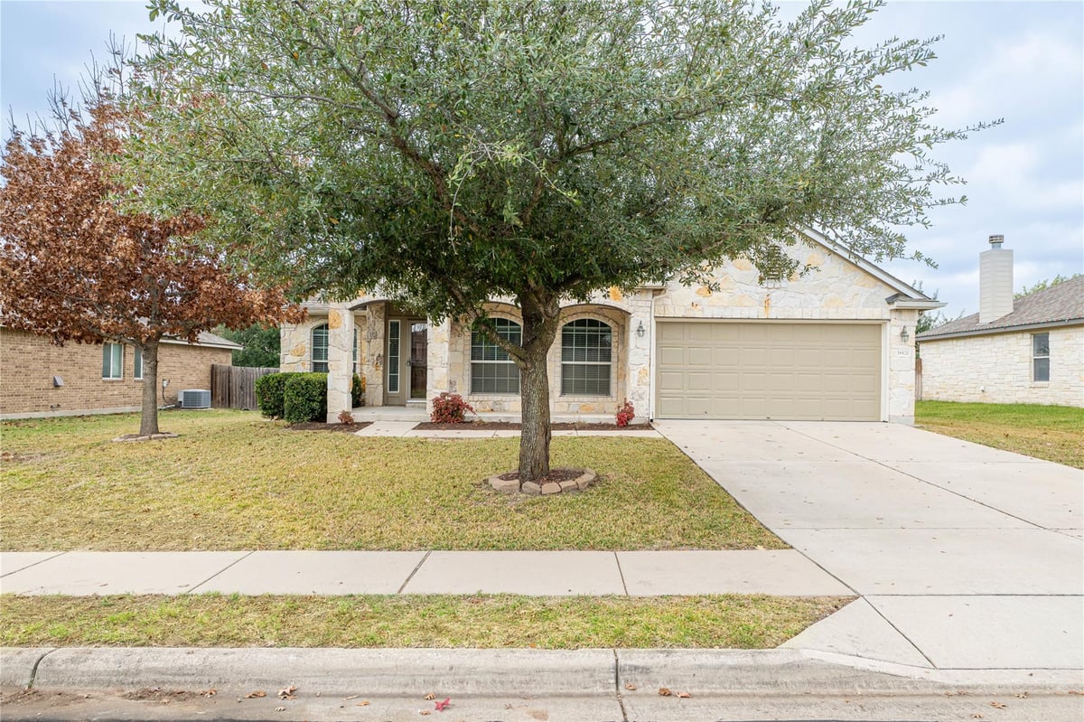 View 18820 Edinburgh Castle Rd in Highland Park North Ph C Sec 18820 Edinburgh Castle Rd - front exterior - Luxury home in Highland Park North Ph C Sec, Pflugerville, TX