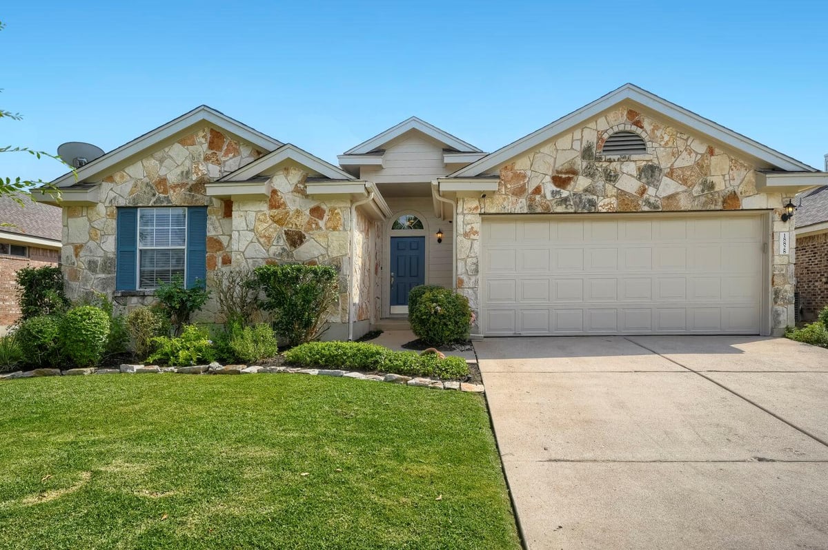 View 18828 Leigh LN in Reserve At Westcreek Amd 18828 Leigh LN - front exterior - Luxury home in Reserve At Westcreek Amd, Pflugerville, TX