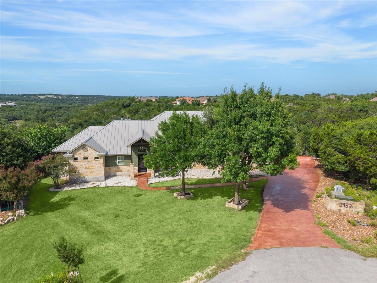 View 1889 Rush CRK in Mountain Spgs Ranch 2 1889 Rush CRK - front exterior - Luxury home in Mountain Spgs Ranch 2, Canyon Lake, TX