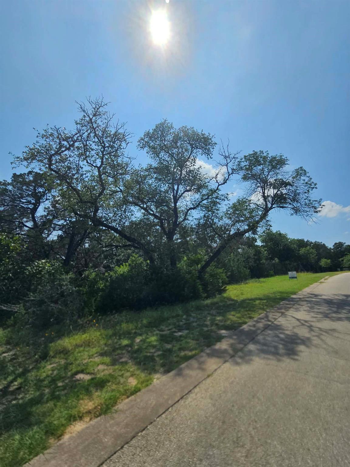 View 18901 Leisure LN in Hollows Ph 2C The 18901 Leisure LN - front exterior - Luxury lot in Hollows Ph 2C The, Lago Vista, TX