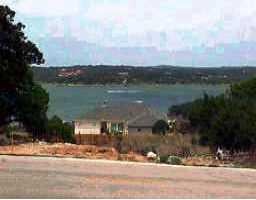 View 18921 Peckham Dr 18921 Peckham Dr - property photo 1 - Luxury lot in Point Venture, TX