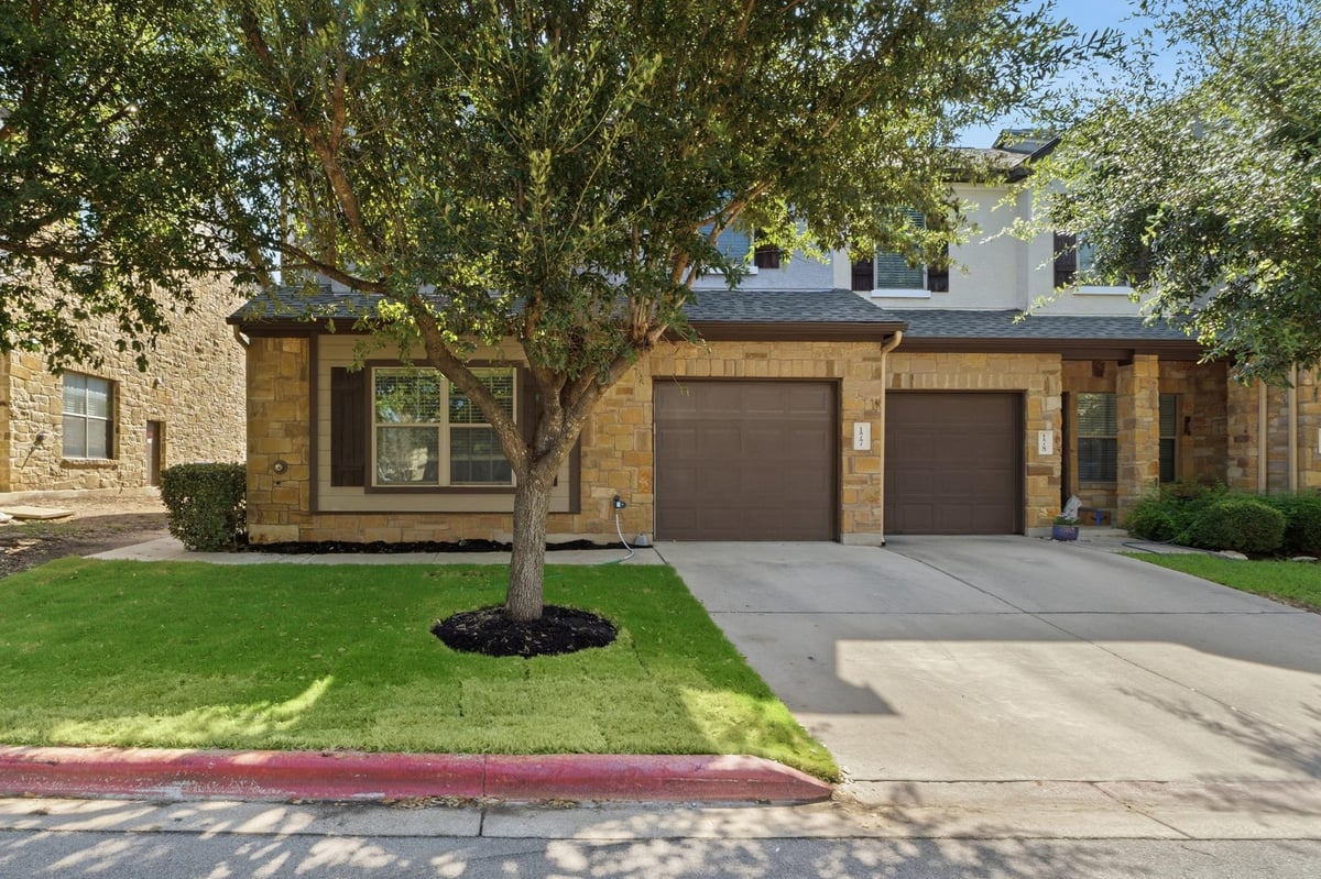 View 1900 Little Elm TRL Unit #177 in Cypress Creek Townhomes 1900 Little Elm TRL Unit #177 - front exterior - Luxury home in Cypress Creek Townhomes, Cedar Park, TX